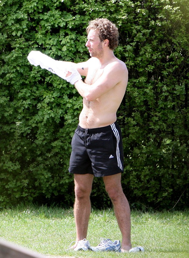 Exclusive - Chris Martin Enjoys The Sunshine, Topless In Primrose Hill.